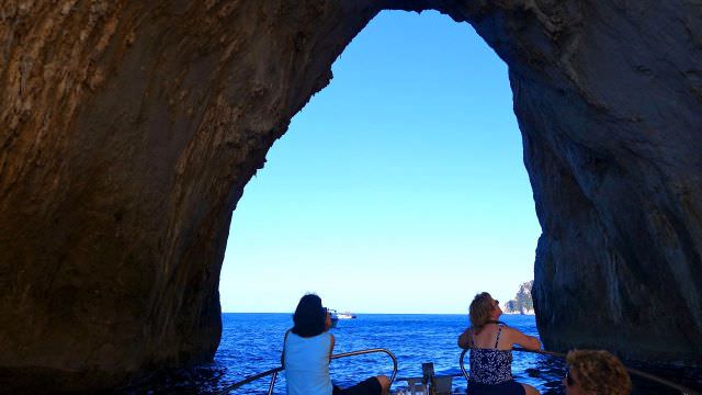 This arch is part of the Faraglione. The three rock islands off the coast of Capri, Italy that make for stunning photos.